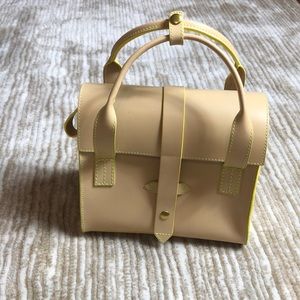 Tan hand bag